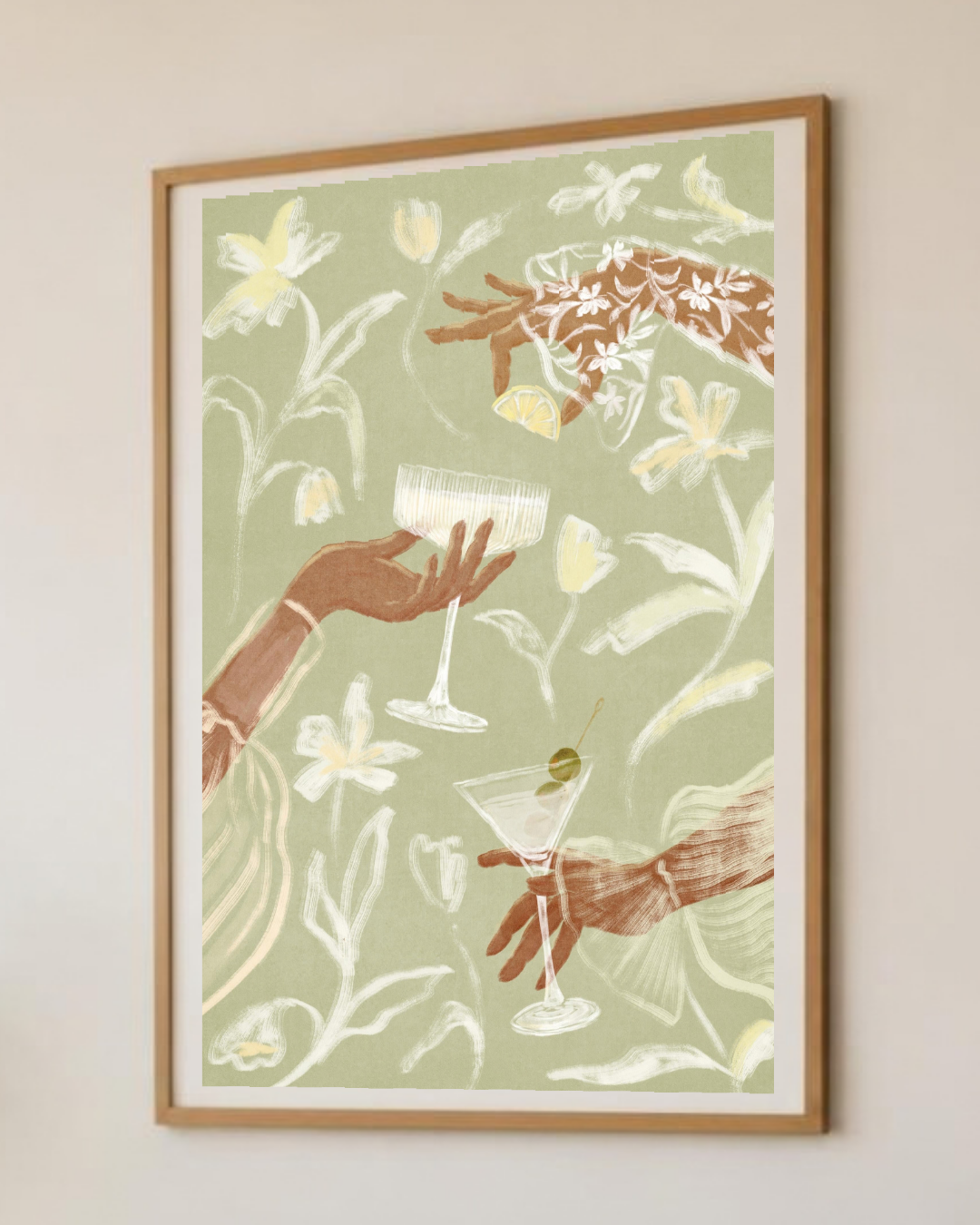 Gros plan sur l'impression de l'affiche : textures de gouache et de craie, verre à martini, olives et fleurs blanches