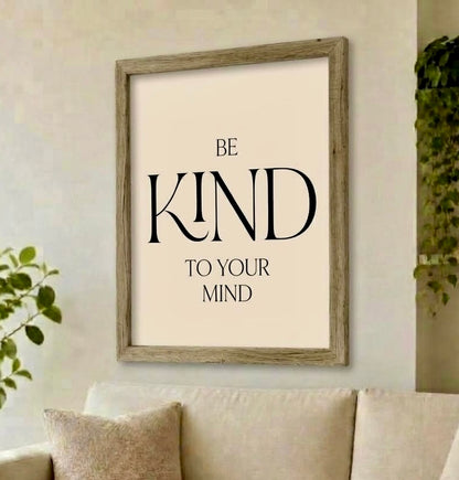 Affiche citation Be Kind to your mind en cadre dans une chambre, ambiance douce beige et noir